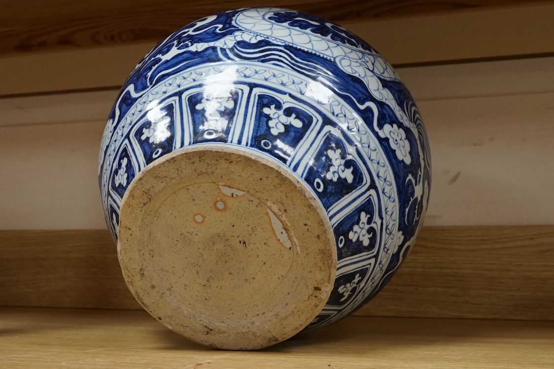 A large Chinese blue and white ‘dragon’ jar, 29cm high